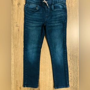 He'll love the comfort of these wardrobe staple boys' denim pull-on pants.